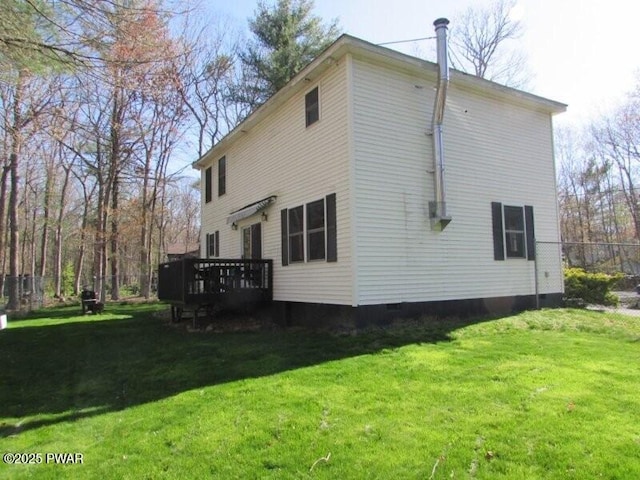 102 Yvonne Ct, Dingmans Ferry, PA 18328 - rear view of house with a lawn, a wooden deck, crawl space, and fence