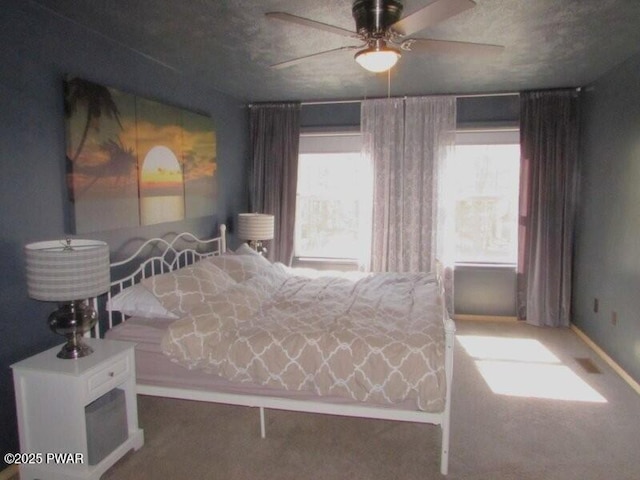 102 Yvonne Ct, Dingmans Ferry, PA 18328 - carpeted bedroom with a ceiling fan and baseboards