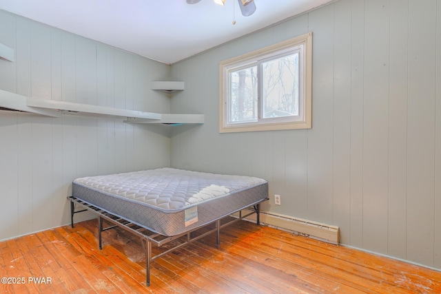 bedroom featuring wood-type flooring