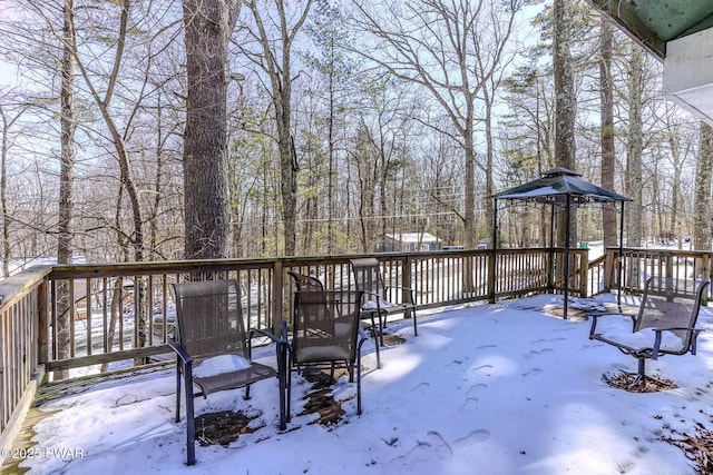 view of snow covered deck