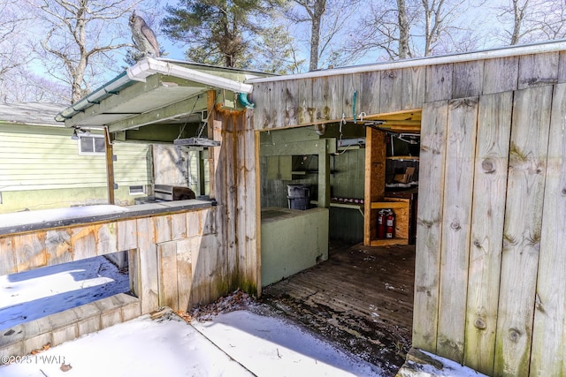 view of patio / terrace featuring an outbuilding