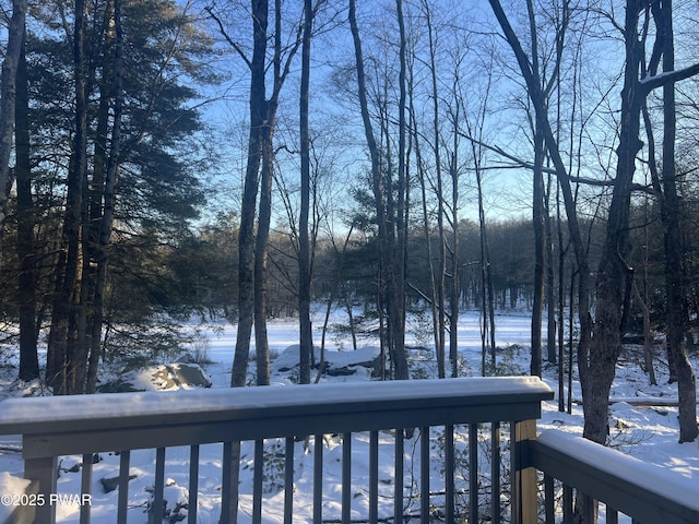 view of snow covered deck