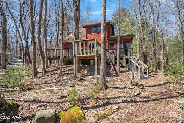 105 Tupelo Dr, Lords Valley, PA 18428 - view of front of house with a wooden deck and stairs