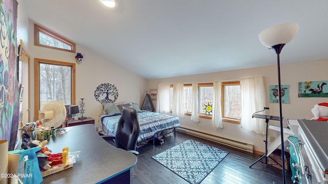 bedroom featuring vaulted ceiling, dark hardwood / wood-style flooring, and a baseboard heating unit