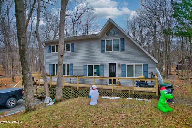 view of front facade featuring a wooden deck