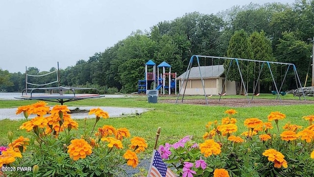 view of playground featuring a lawn