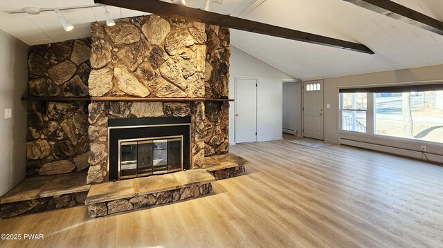 details with a fireplace, hardwood / wood-style floors, and track lighting