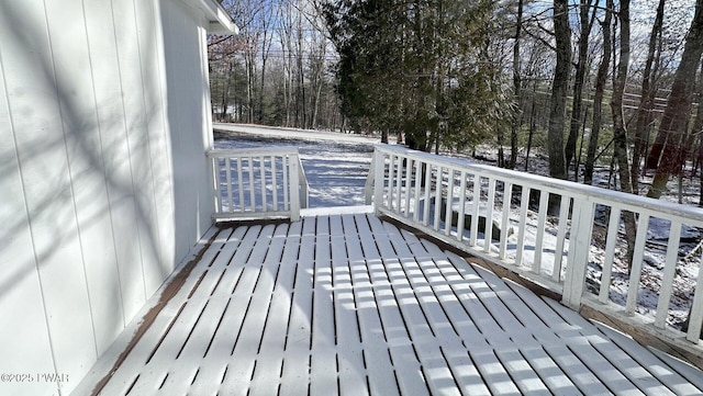 view of snow covered deck