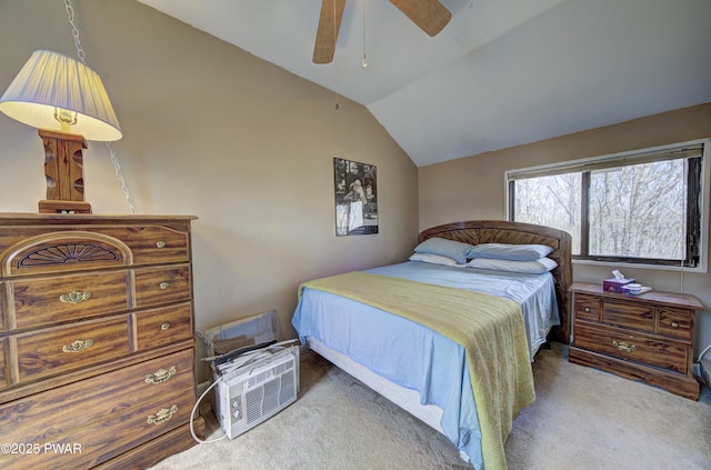 bedroom featuring vaulted ceiling, carpet, and ceiling fan