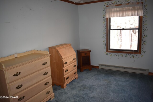 unfurnished bedroom featuring dark colored carpet, crown molding, and a baseboard heating unit