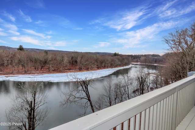 water view with a wooded view