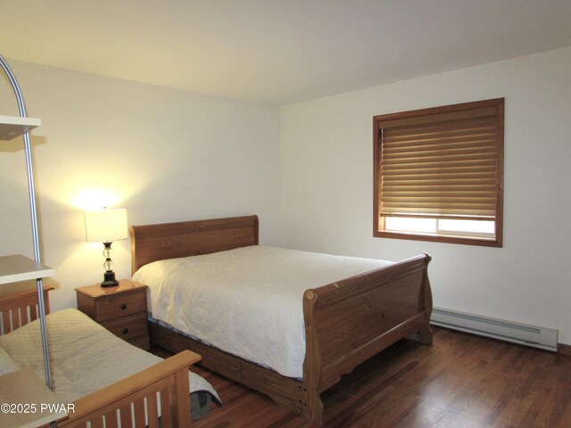 169 N Lake Dr, Dingmans Ferry, PA 18328 - bedroom featuring a baseboard heating unit and wood finished floors