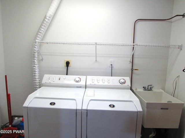 169 N Lake Dr, Dingmans Ferry, PA 18328 - laundry room featuring separate washer and dryer, laundry area, and a sink