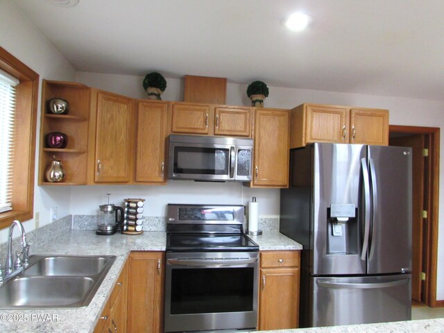 169 N Lake Dr, Dingmans Ferry, PA 18328 - kitchen featuring a sink, open shelves, and stainless steel appliances