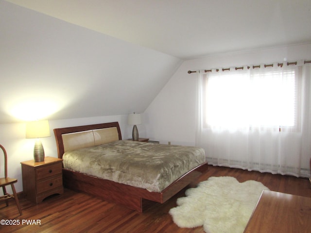169 N Lake Dr, Dingmans Ferry, PA 18328 - bedroom featuring wood finished floors and vaulted ceiling