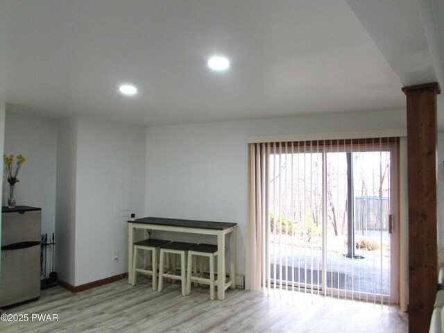 169 N Lake Dr, Dingmans Ferry, PA 18328 - living room with wood finished floors, decorative columns, baseboards, and recessed lighting