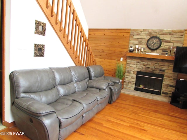 169 N Lake Dr, Dingmans Ferry, PA 18328 - living room with stairway, wood finished floors, and a fireplace