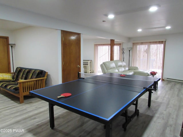 169 N Lake Dr, Dingmans Ferry, PA 18328 - playroom with baseboard heating, wood finished floors, and recessed lighting