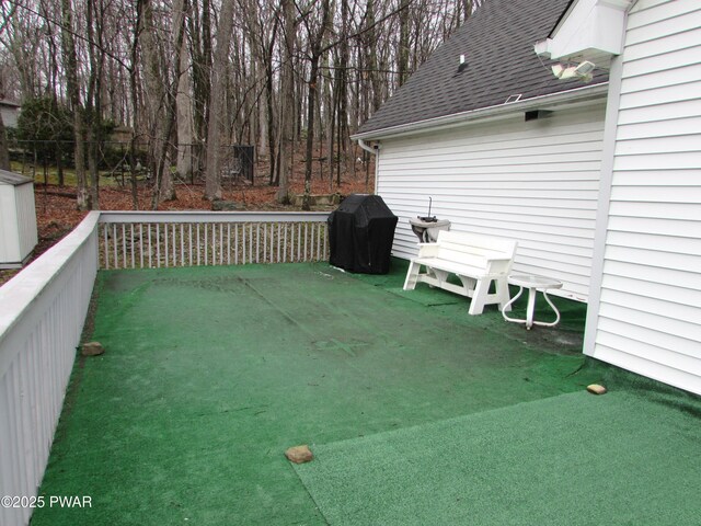 169 N Lake Dr, Dingmans Ferry, PA 18328 - wooden terrace featuring a grill