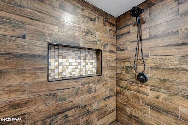 interior space with a tile shower