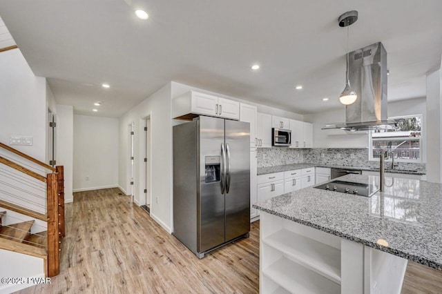 kitchen with stainless steel appliances, white cabinetry, pendant lighting, and island range hood