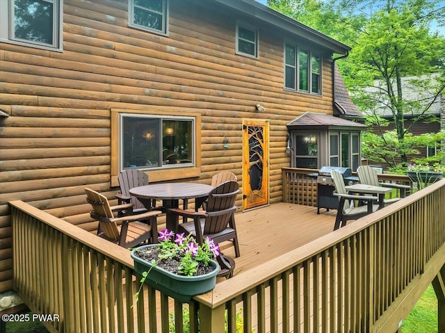 210 Fawn Lake Dr, Hawley, PA 18428 - wooden deck with outdoor dining space