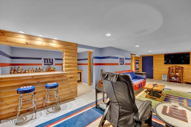 210 Fawn Lake Dr, Hawley, PA 18428 - rec room featuring recessed lighting, carpet flooring, a bar, and wooden walls