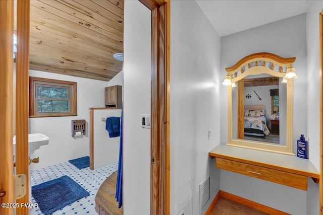 210 Fawn Lake Dr, Hawley, PA 18428 - bathroom featuring vaulted ceiling, wood ceiling, and ensuite bath