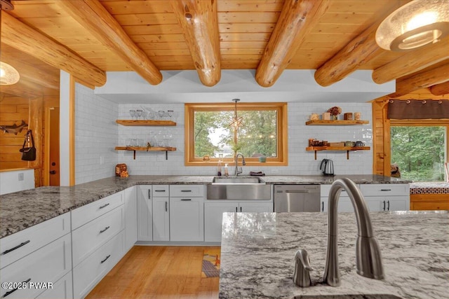210 Fawn Lake Dr, Hawley, PA 18428 - kitchen with open shelves, dishwasher, plenty of natural light, and a wooden ceiling with exposed beams
