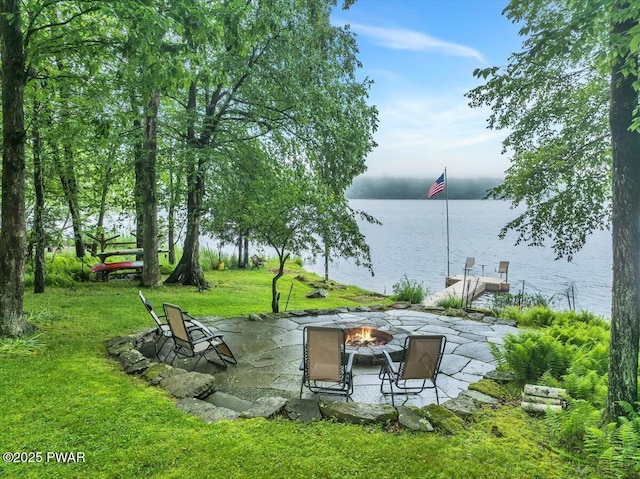 210 Fawn Lake Dr, Hawley, PA 18428 - view of patio / terrace with a fire pit and a water view