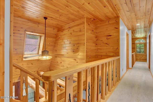 210 Fawn Lake Dr, Hawley, PA 18428 - corridor with wooden ceiling, wood walls, wood finished floors, an upstairs landing, and a sauna