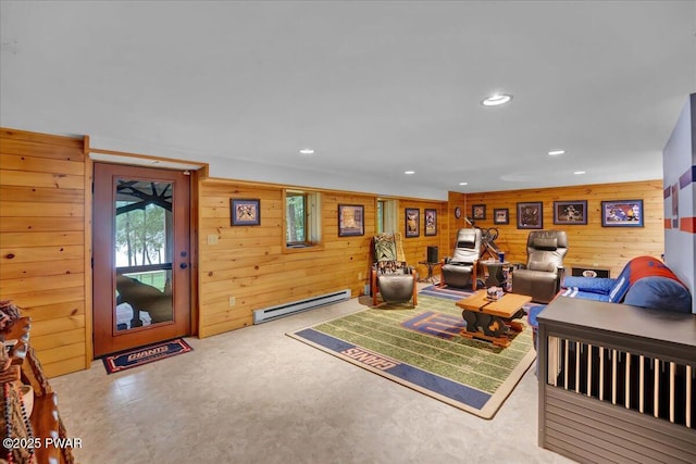 210 Fawn Lake Dr, Hawley, PA 18428 - living room with a baseboard heating unit, wooden walls, and recessed lighting