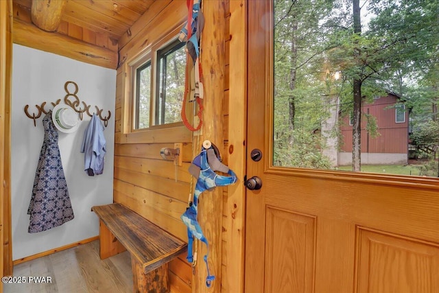 210 Fawn Lake Dr, Hawley, PA 18428 - mudroom with wood finished floors, wooden ceiling, and wood walls