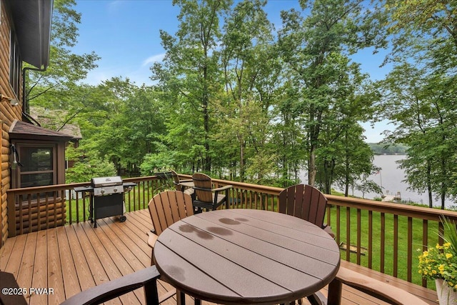 210 Fawn Lake Dr, Hawley, PA 18428 - deck featuring grilling area, outdoor dining area, and a lawn