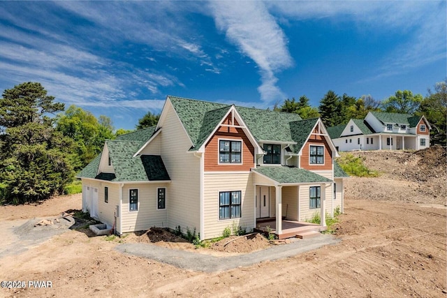 8 Matthews Dr, Milford, PA 18337 - view of front facade with a shingled roof