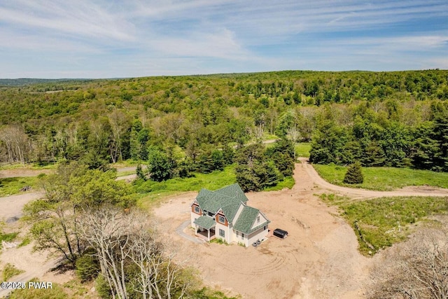 8 Matthews Dr, Milford, PA 18337 - aerial view of property and surrounding area featuring a heavily wooded area