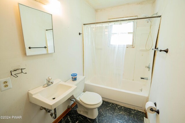 full bathroom with toilet, shower / bath combo with shower curtain, and sink