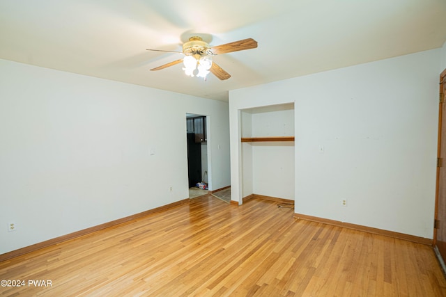 unfurnished bedroom featuring light hardwood / wood-style flooring and ceiling fan