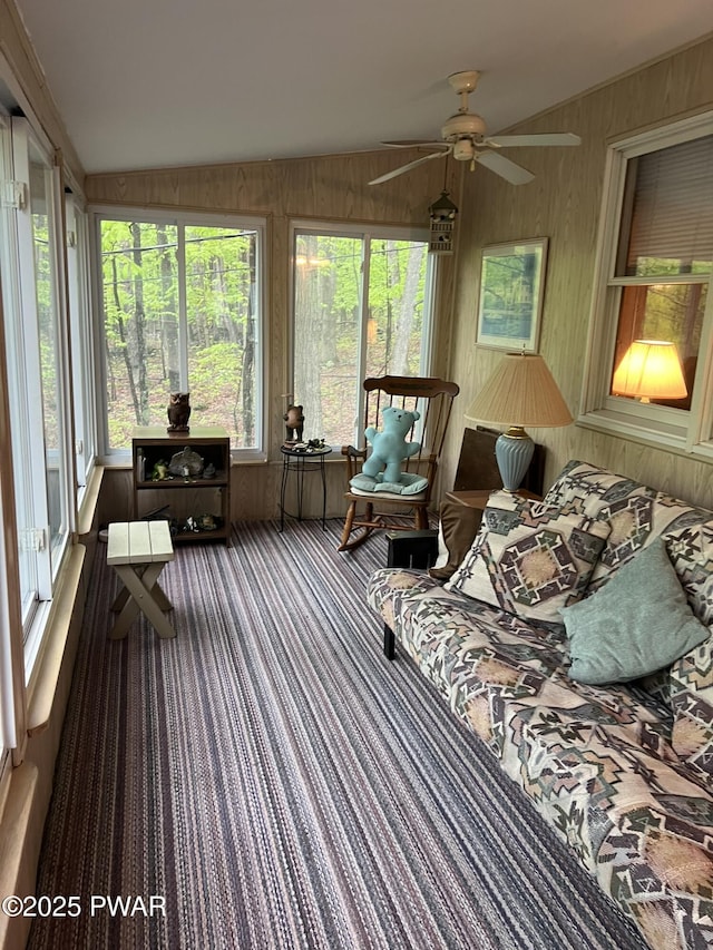 259 Florence Trl, Hawley, PA 18428 - sunroom with a ceiling fan, wood walls, carpet floors, and vaulted ceiling