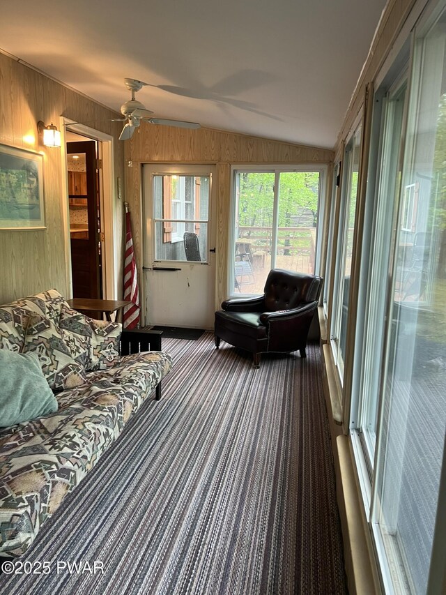 259 Florence Trl, Hawley, PA 18428 - sunroom featuring wooden walls, carpet floors, and vaulted ceiling
