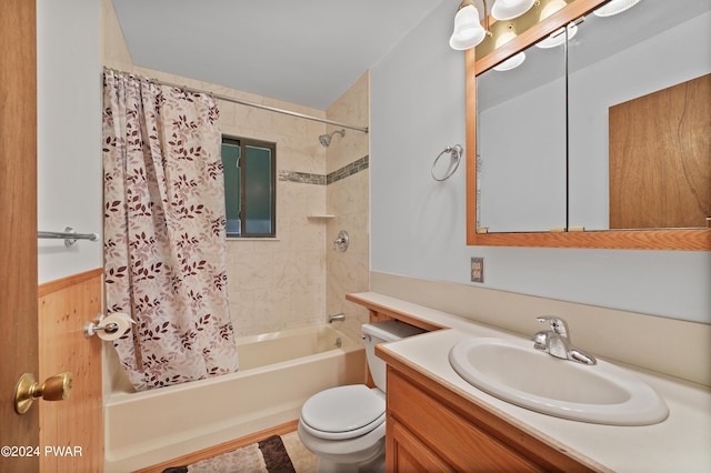 full bathroom featuring shower / tub combo with curtain, vanity, and toilet