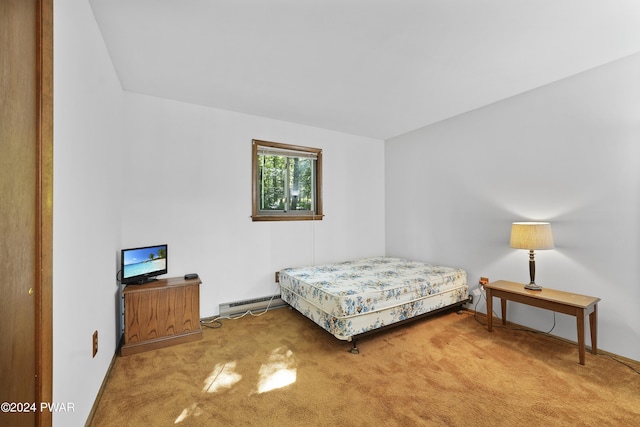 carpeted bedroom with a baseboard heating unit