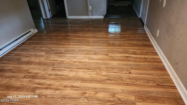 details with hardwood / wood-style flooring