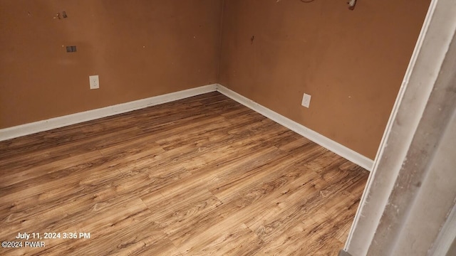 empty room featuring hardwood / wood-style floors