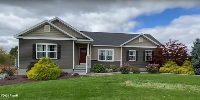 view of front of home featuring a front lawn