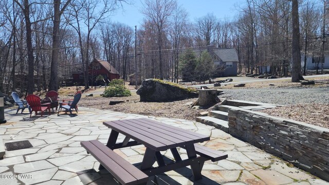 213 Powderhorn Dr, Lackawaxen, PA 18435 - view of patio featuring an outdoor fire pit