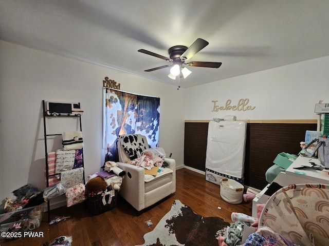 bedroom with wood finished floors and ceiling fan