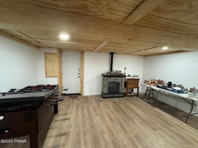 game room featuring wood finished floors, wooden ceiling, and baseboards