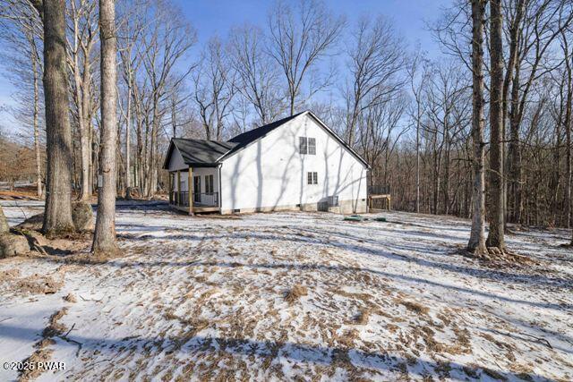 view of snow covered property