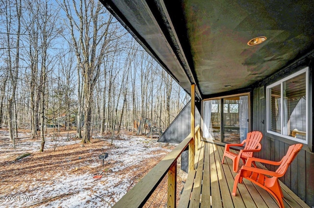 view of snow covered deck